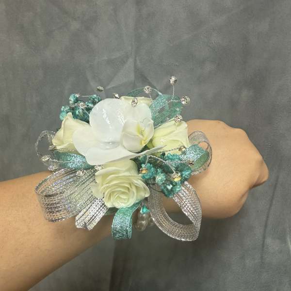 Aqua Silver Orchid spray roses corsage