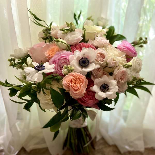 Pink and white bouquet with anemones and roses