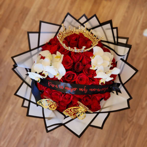Bouquet of red roses with white orchids and a gold crown