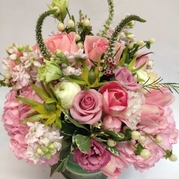 Pink and white mixed bouquet in a glass vase