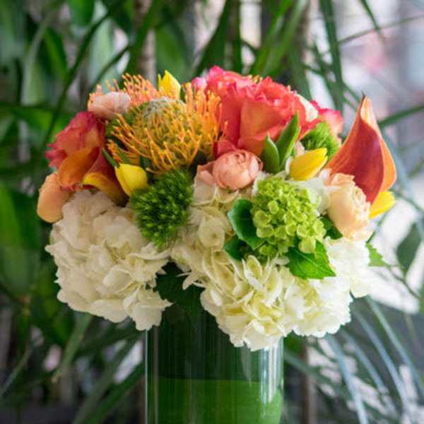 Colorful mixed bouquet in a clear glass vase