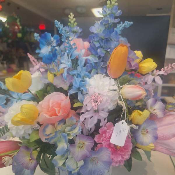 Silk arrangement of pastel tulips and mixed flowers in a white bowl container