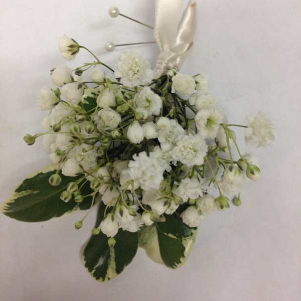 White floral boutonniere with ribbon and pearl pins