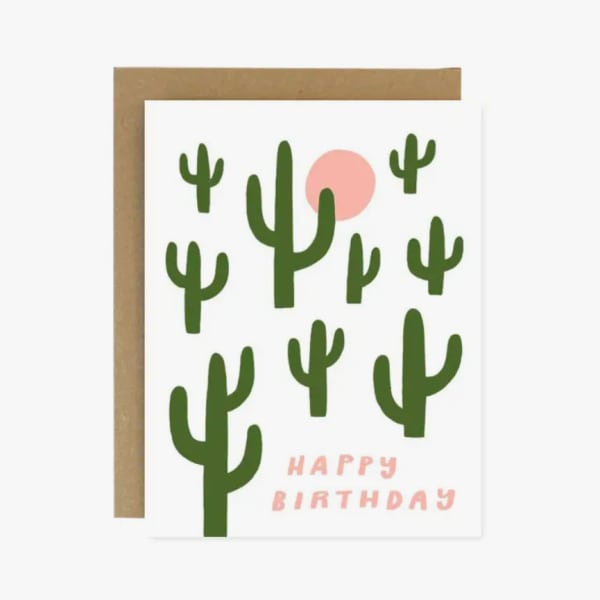Birthday card with green cactus shapes and pink text