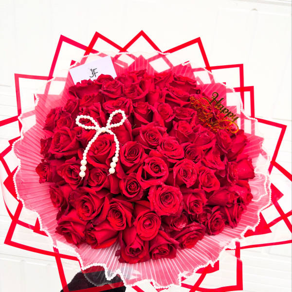 Red Roses with red wrapping