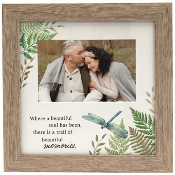 Wooden memorial frame with a couple's photo and a remembrance quote