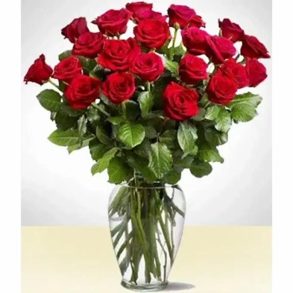 Bouquet of red roses in a clear glass vase