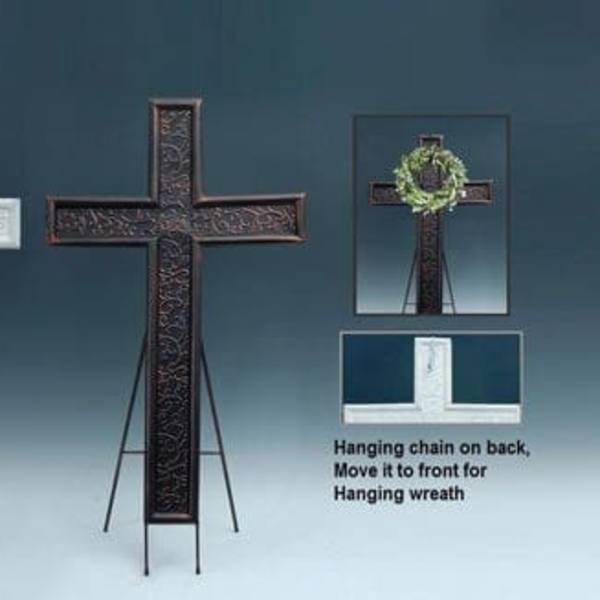 Decorative standing crosses on easels, one with a small wreath