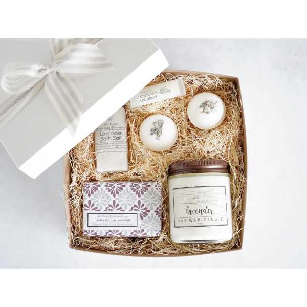Lavender-themed gift box with soap, bath salt, candles, and bath bombs