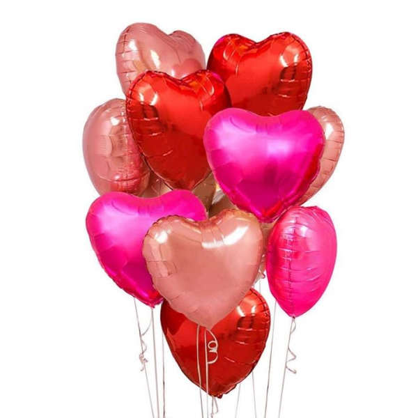 Cluster of heart-shaped balloons in red, pink, and rose gold