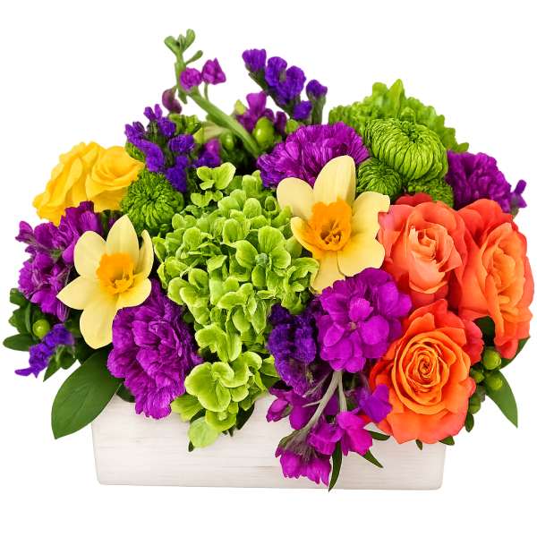 Low rectangular arrangement with orange roses, yellow daffodils, green hydrangeas, and purple flowers.