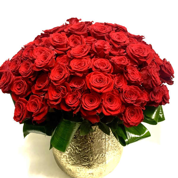 Red rose bouquet in a gold textured vase