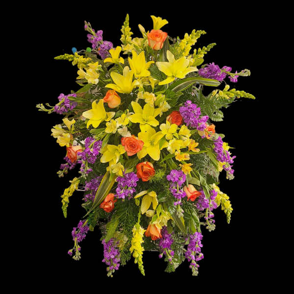 Tall bouquet of yellow lilies, orange roses, and purple flowers
