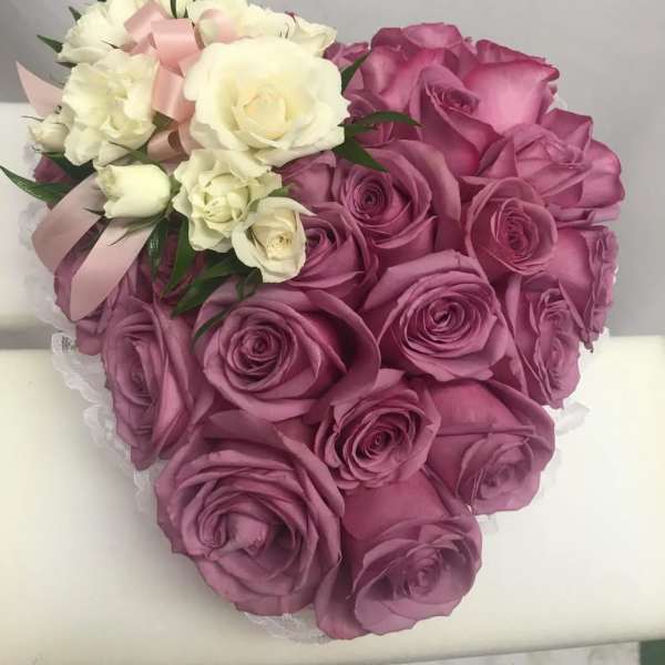 Pink and white rose bouquet with a satin ribbon