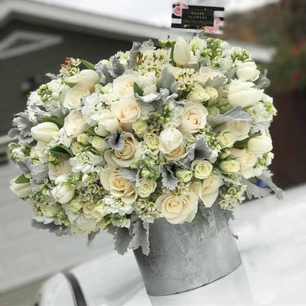 White rose and tulip bouquet in a silver box