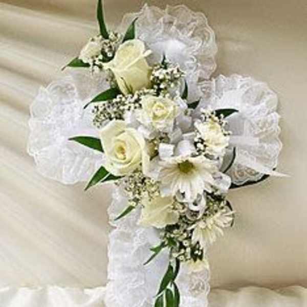 White floral cross with lace ribbon and roses