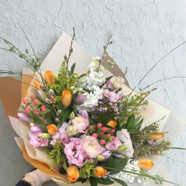 Spring break bouquet- tulips, rununculus,Lisiantus ,bear grass