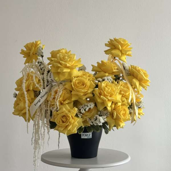 Sunny pot yellow French rose arrangement