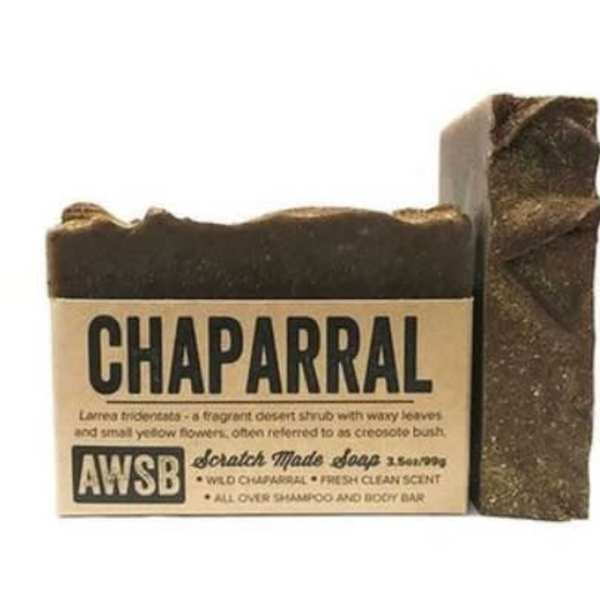 Two brown rectangular bars of chaparral scratch-made soap with kraft paper label