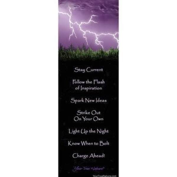 Tall purple bookmark with lightning bolts above a dark tree line and inspirational text.
