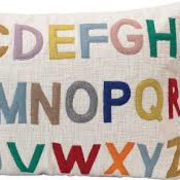 Decorative pillow with colorful alphabet letters