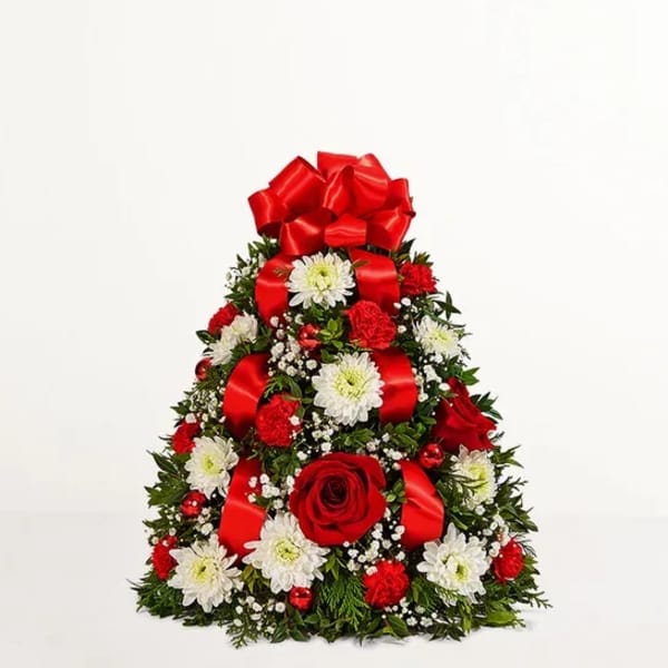 Triangular floral arrangement with red bows, red roses, and white daisies