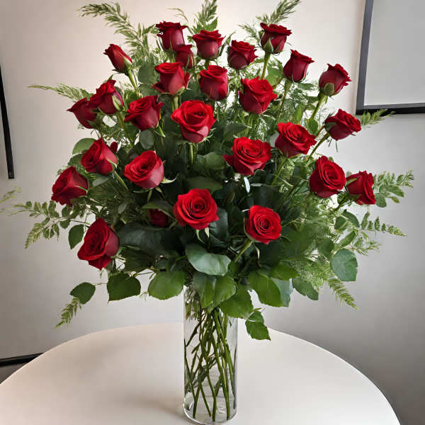 Bouquet of red roses in a clear glass vase