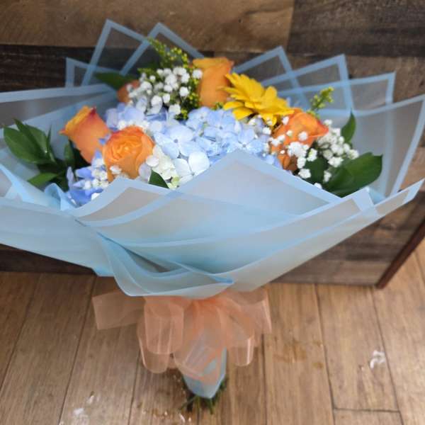 orange hand bouquet