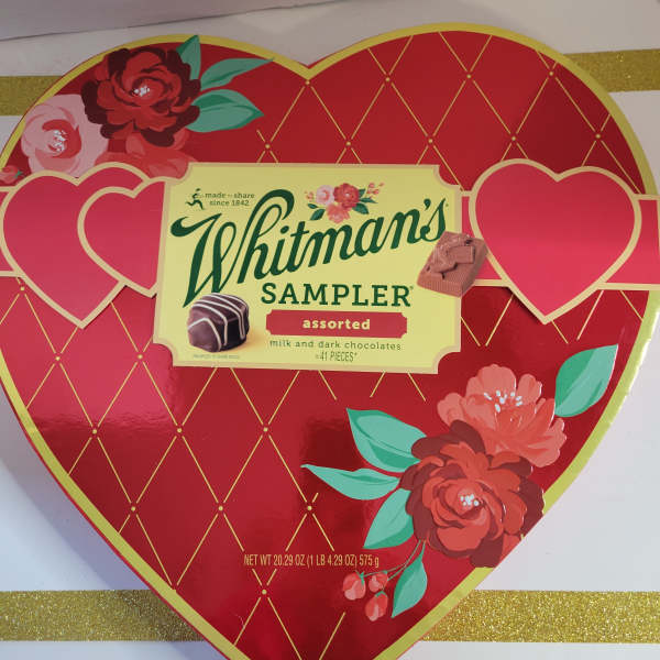 Heart-shaped Whitman's Sampler chocolate box with floral decoration