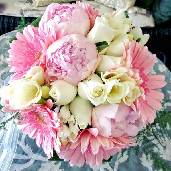 Pink and white bouquet with peonies, gerbera daisies, and calla lilies