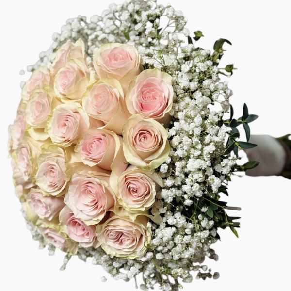 Bouquet of pale pink roses with white baby's breath