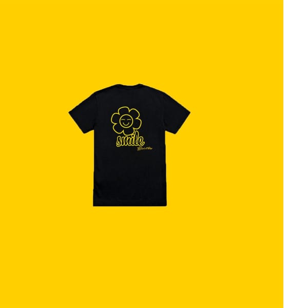 Black T-shirt with a yellow smiley flower graphic on a yellow background
