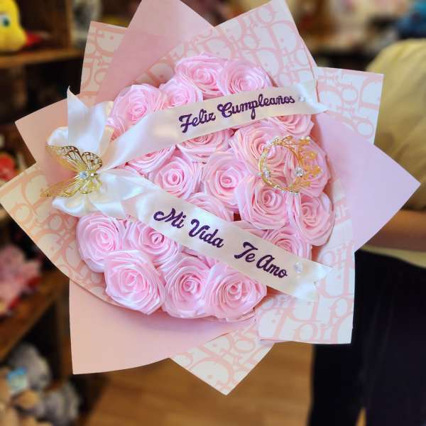 Pink rose bouquet with a satin ribbon and birthday message