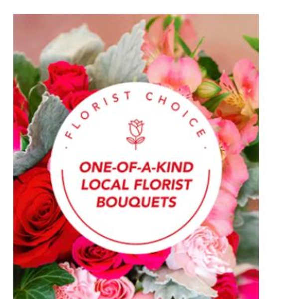 Mixed bouquet of red and pink roses with pale pink blooms