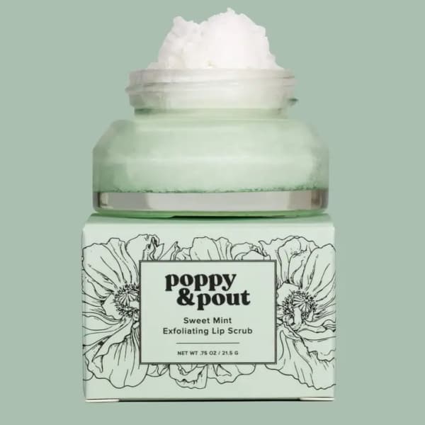 Jar of sweet mint lip scrub on a floral-patterned box