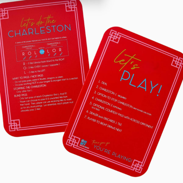 Two red game cards with Charleston instructions and play steps
