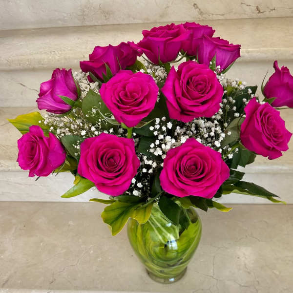 12 Roses Hot Pink arranged in a vase