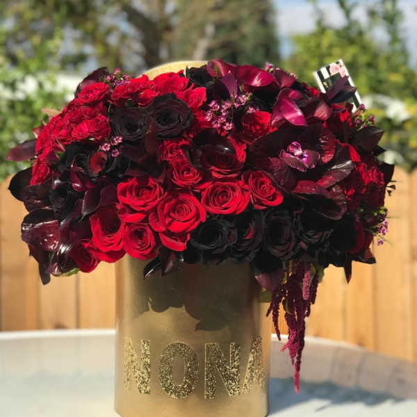 Midnight romance gold box with mixed black and red roses