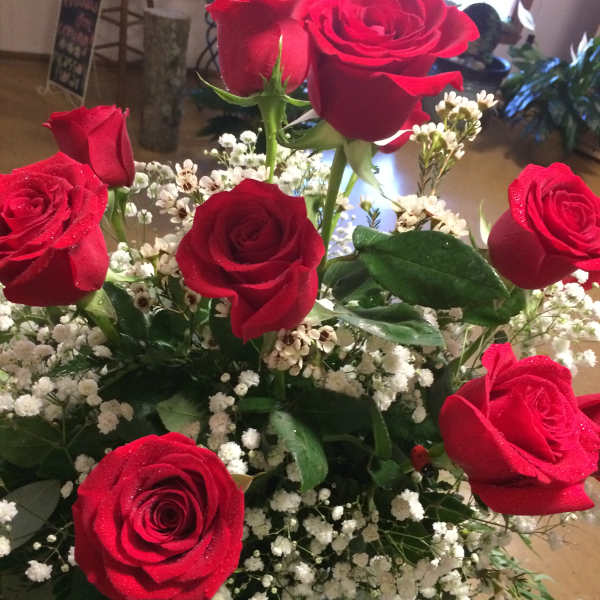 Bouquet of red roses with white baby's breath