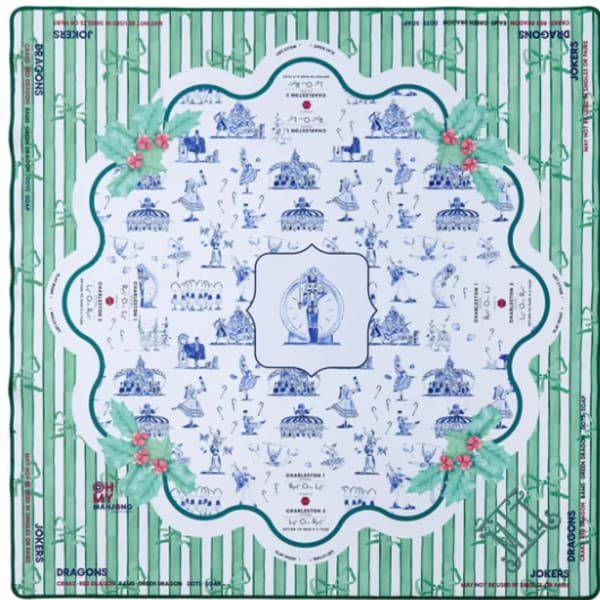 Decorative square fabric with green stripes and blue toile-style illustrations