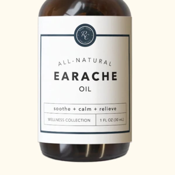 Amber dropper bottle labeled earache oil