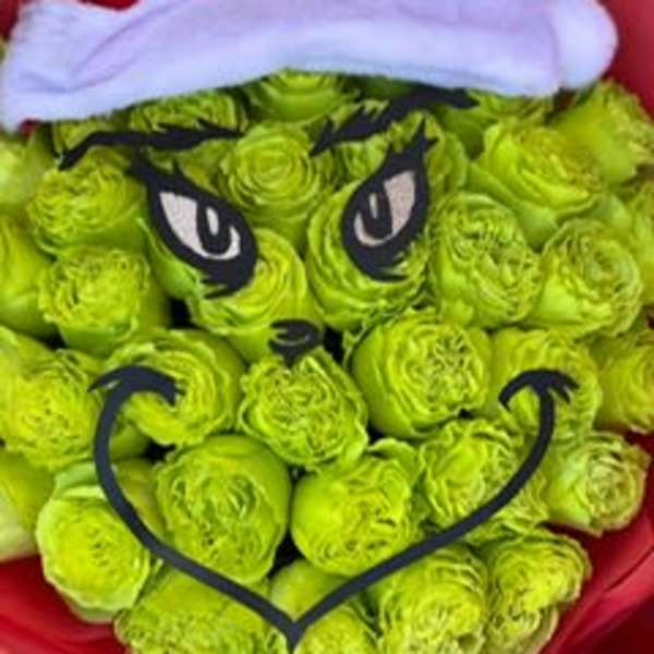 Green rose bouquet styled like the Grinch with a Santa hat