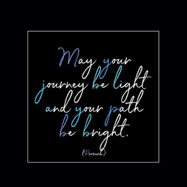 Framed quote print with blue and white script on a black background