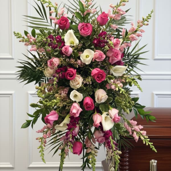 Tall standing floral spray with pink roses and white calla lilies