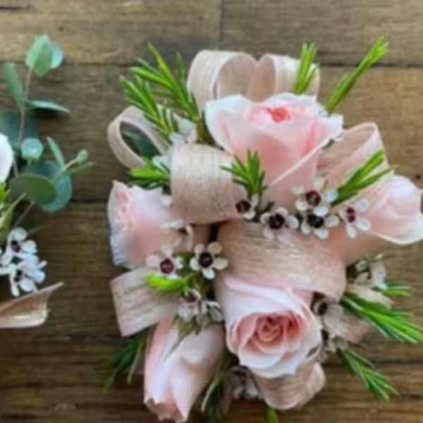 Pastel pink rose corsage and boutineer combo