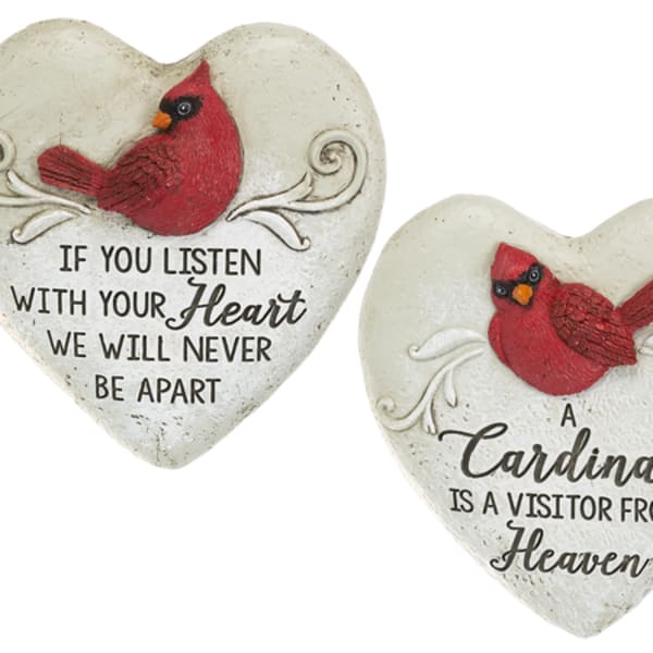 Two heart-shaped memorial plaques with red cardinals and text.