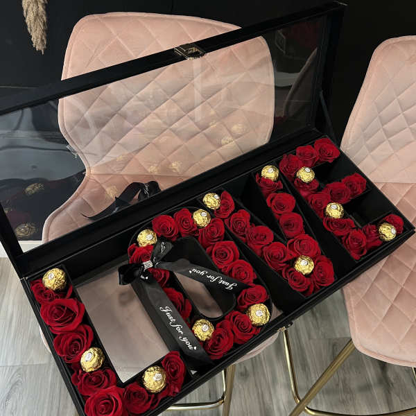 nice red roses with chocolate