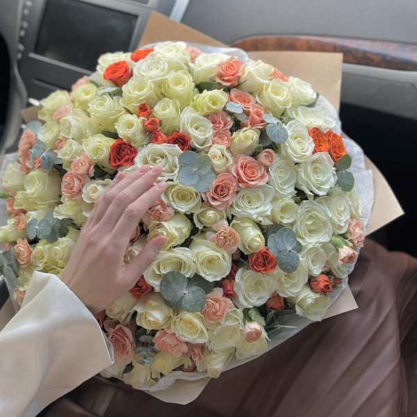 Bouquet of mixed warm-colored roses.