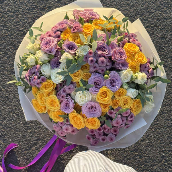 Bouquet with purple and yellow bush roses