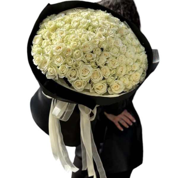 Bouquet of 100 white roses in black packaging